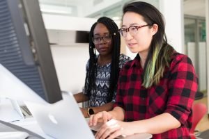 2 women at computer